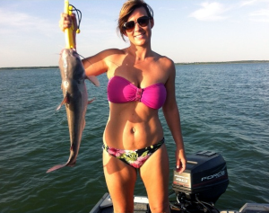 Woman with a fish she caught